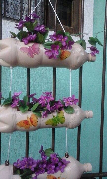 decoração com borboletas em vasos