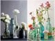 Arranjos de flores com garrafas de vidro